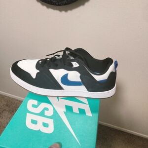Nike Black and Blue Athletic Shoes with Classic Design